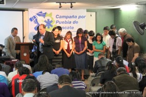 Brother Wynne praying for those that surrendered their life for full-time service